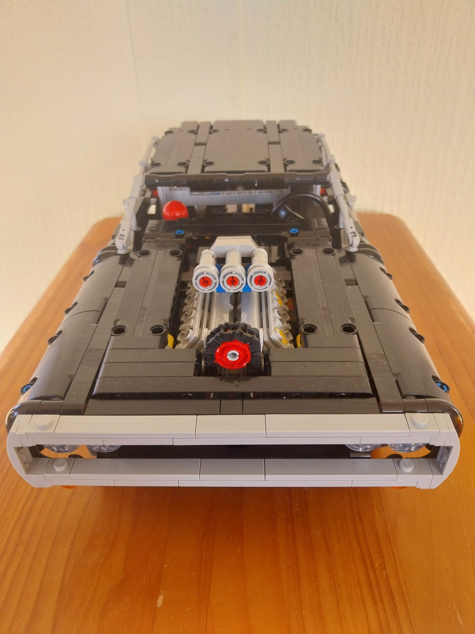 LEGO Technic Dom's Dodge Charger 42111 member build, full view showing flat black bodywork and supercharger blower