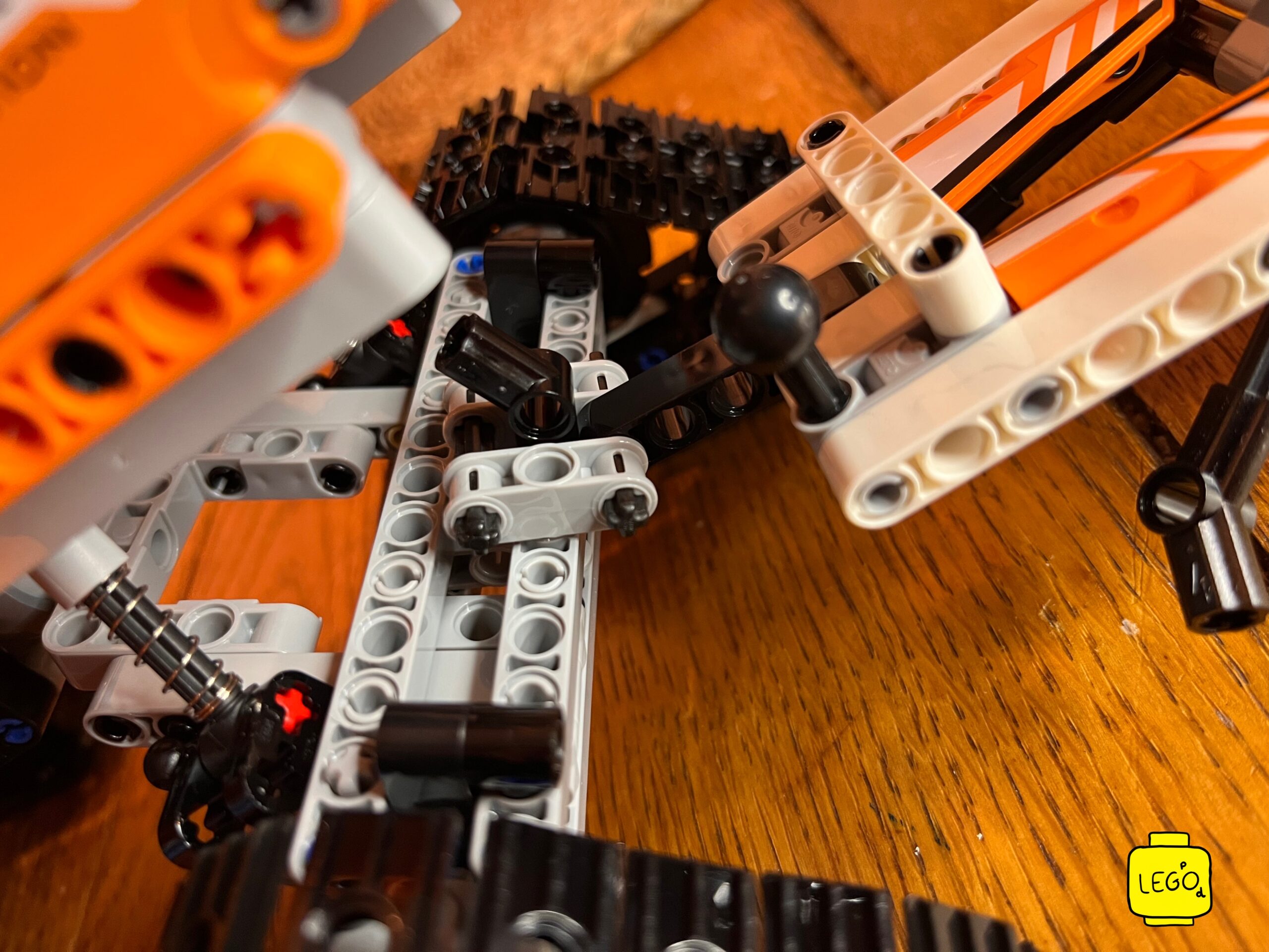 LEGO Technic 42099 X-treme Off-Roader individual rubber track module close-up during build