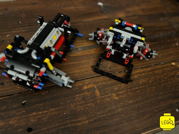 LEGO Technic 42111 Doms Dodge Charger main body assemblies coming together with yellow gear elements