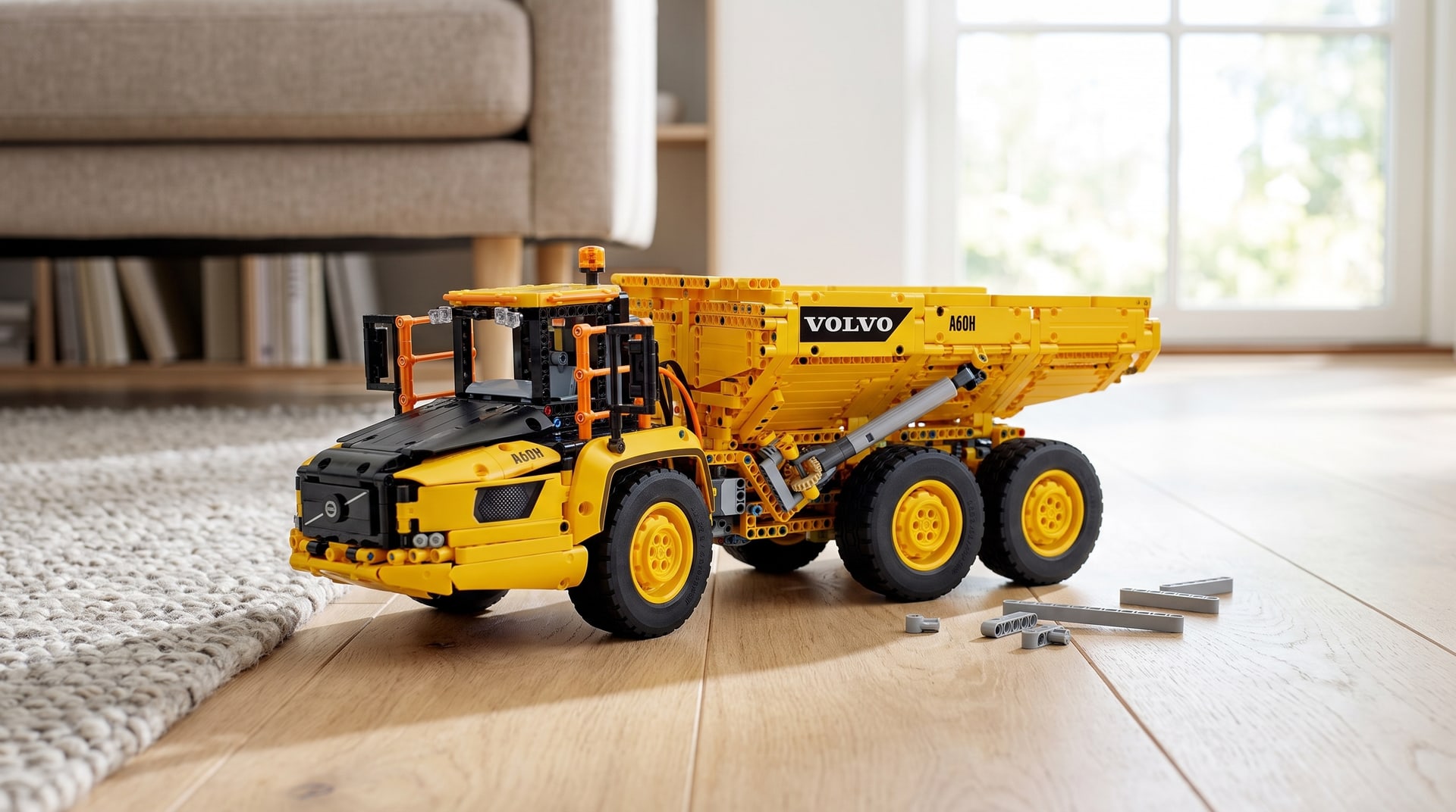 LEGO Technic 6x6 Volvo Articulated Hauler (42114) on a living room floor