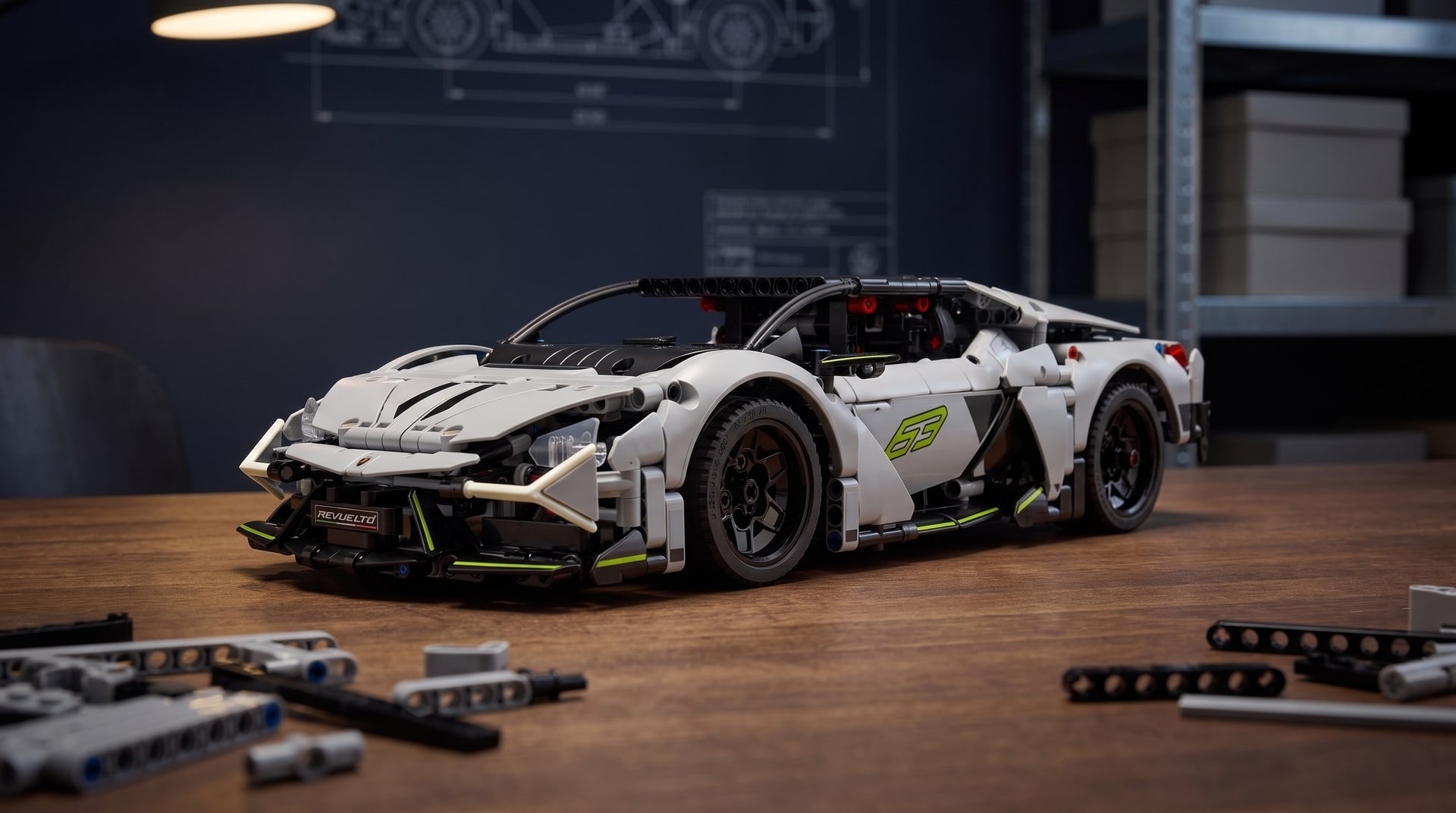 LEGO Technic Lamborghini Revuelto (42214) on a workbench in a home workshop