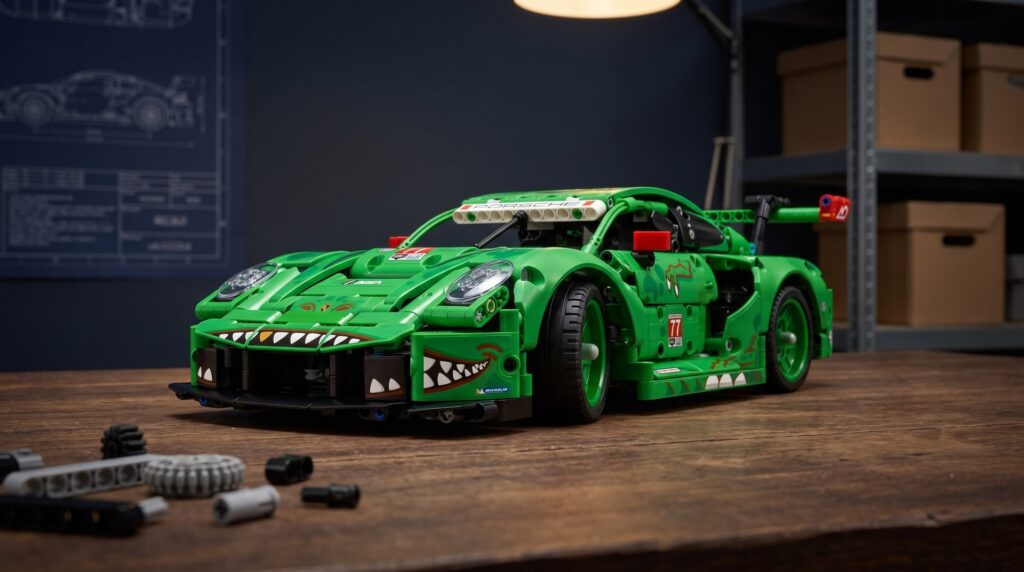 LEGO Technic Porsche 911 GT3 R REXY AO Racing (42224) on a workbench in a home workshop