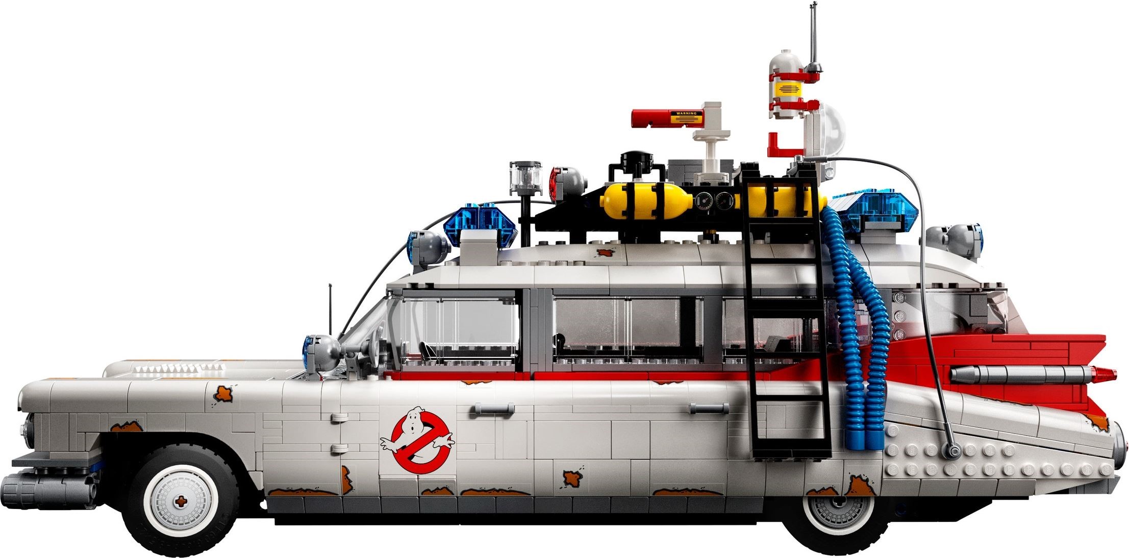 Side profile of LEGO Ghostbusters ECTO-1 (10274) showing the roof ladder, blue hoses, red tail fins, rust stickers and the full roof rack