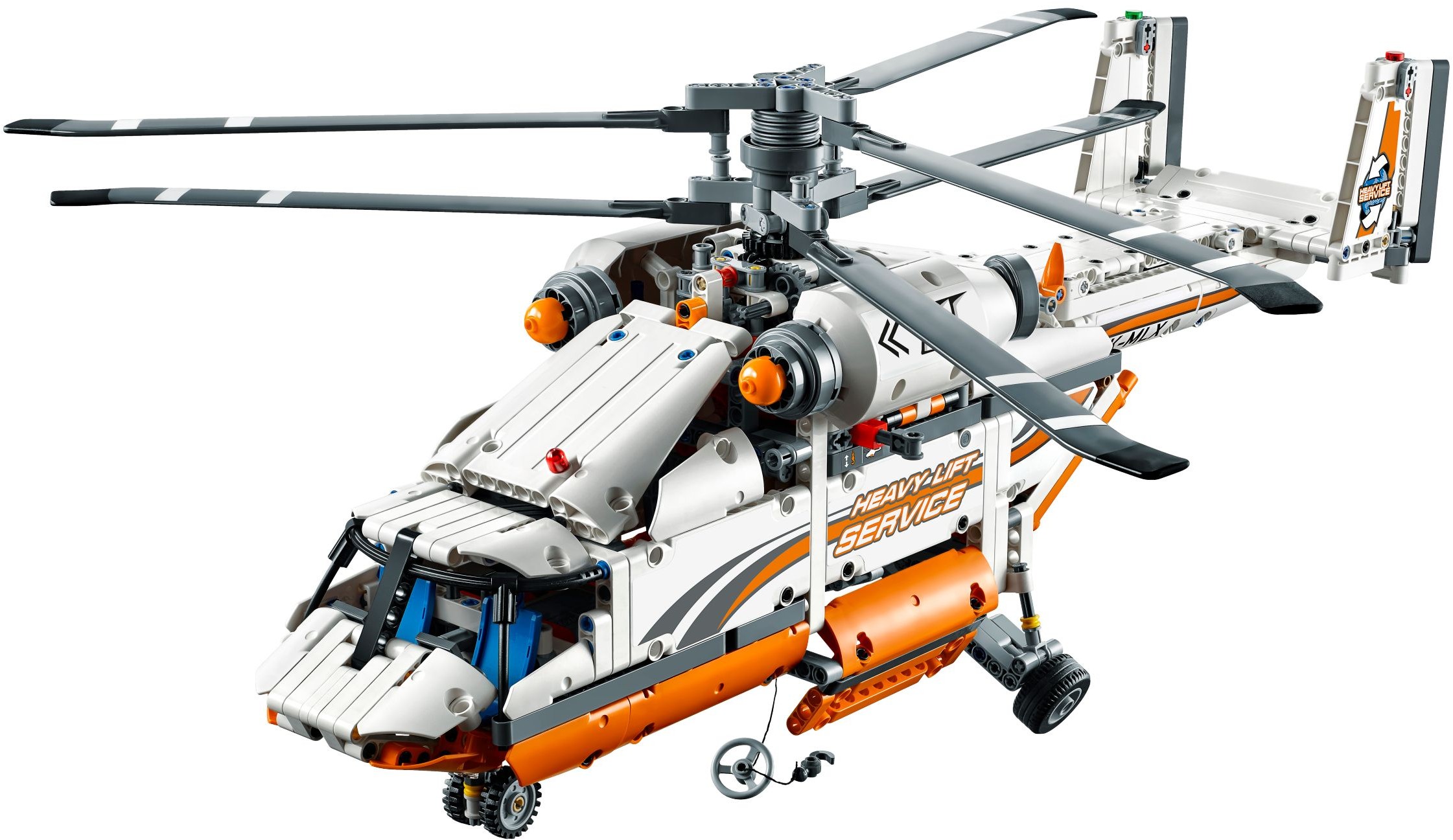 LEGO Technic Heavy Lift Helicopter (42052) from the front left with the winch wire and hook lowered below the cargo bay, the rear wheels down and both rotors stacked on the mast