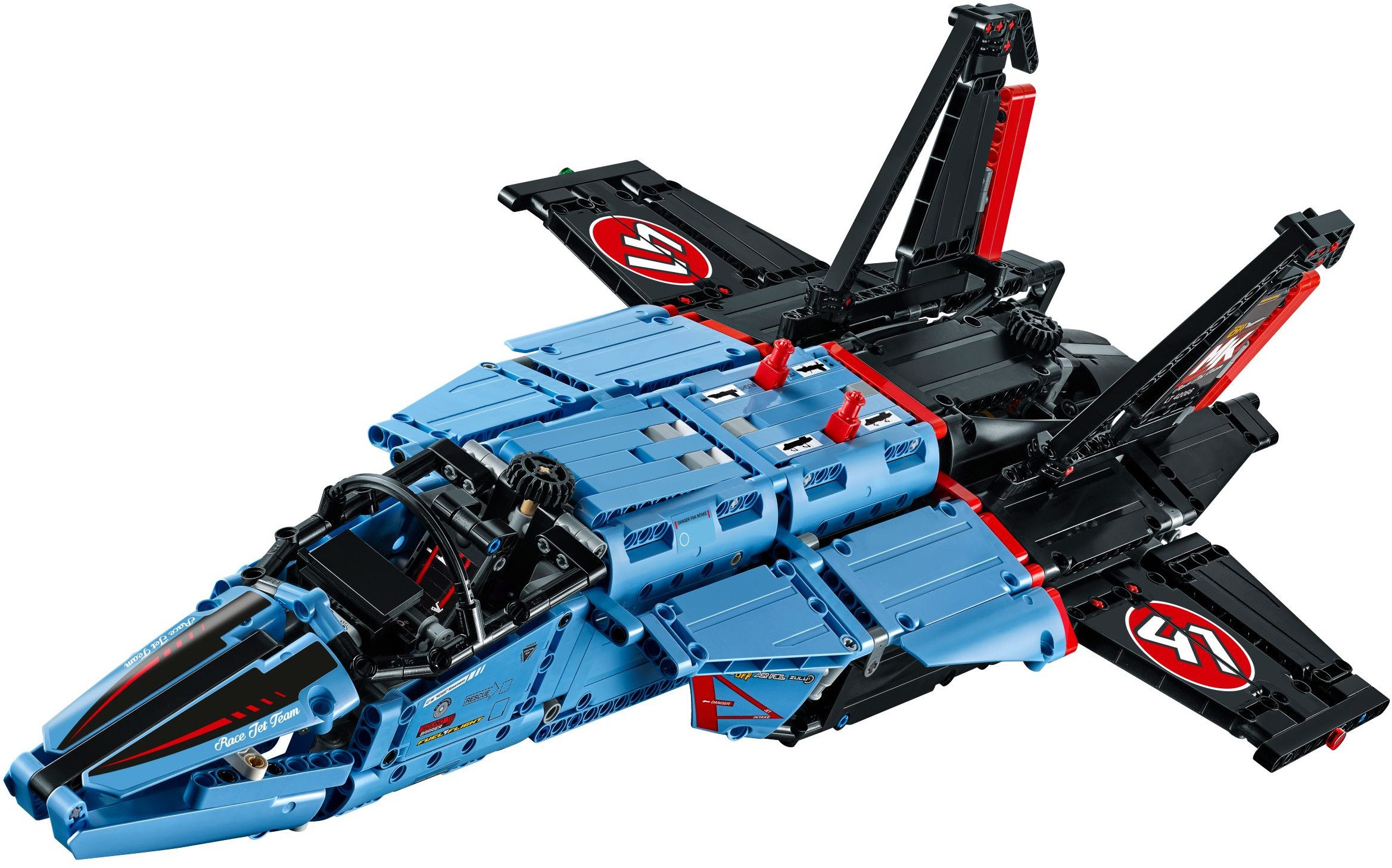 LEGO Technic Air Race Jet (42066) in level flight trim, fan doors shut, two red levers on the spine, black knob behind the cockpit and the undercarriage folded away