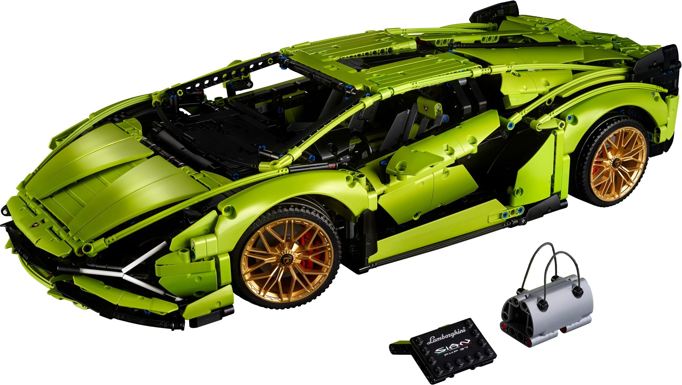 LEGO Technic Lamborghini Sián FKP 37 (42115) in lime green with gold rims, front three-quarter view, with the printed black display plate and the grey overnight bag beside it, official product image