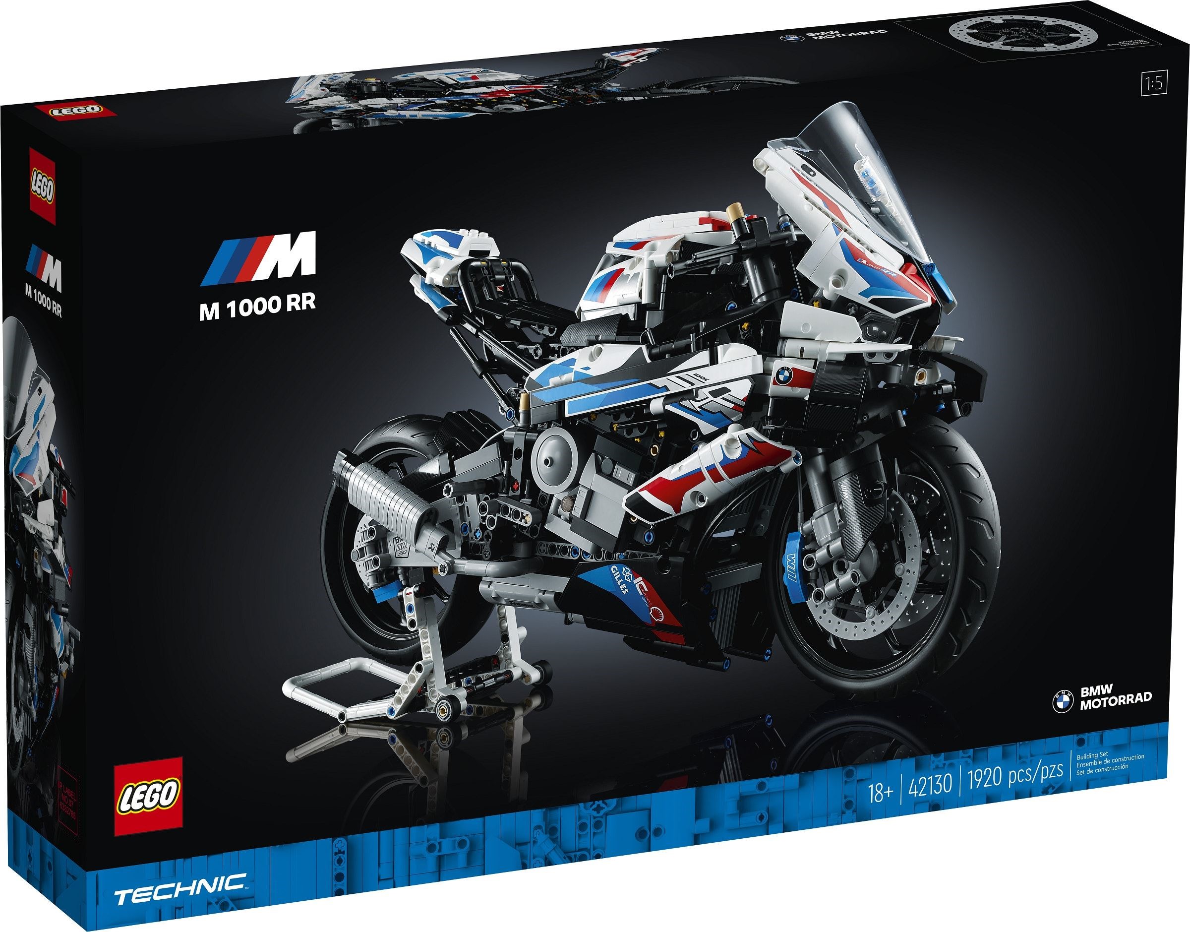 Front of the box for LEGO Technic BMW M 1000 RR (42130), showing the bike on its racing stand from the right front, with the exhaust can behind the engine and the M 1000 RR logo