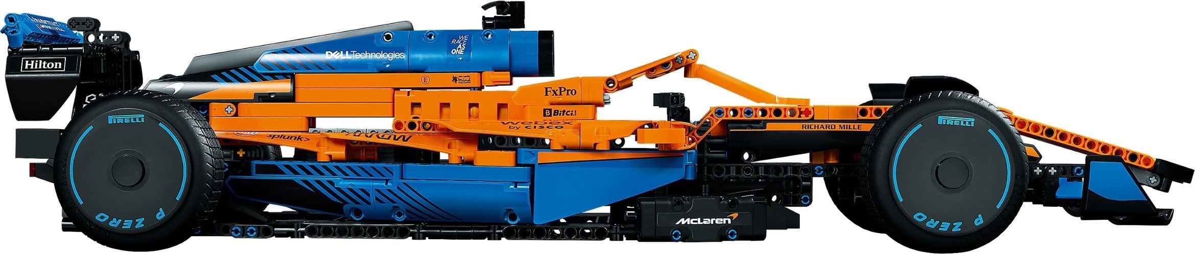 Side profile of LEGO Technic McLaren Formula 1 Race Car (42141) showing the full 65 cm length, the treaded tyres with stickered P Zero wheel covers, the low nose and the Hilton rear wing end plate